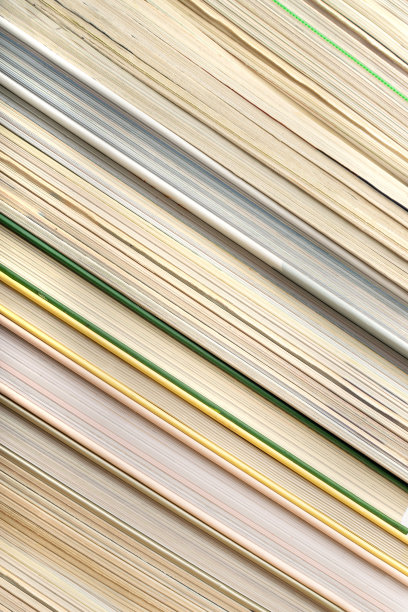 书籍堆叠纹理背景，旧杂志边缘图片下载