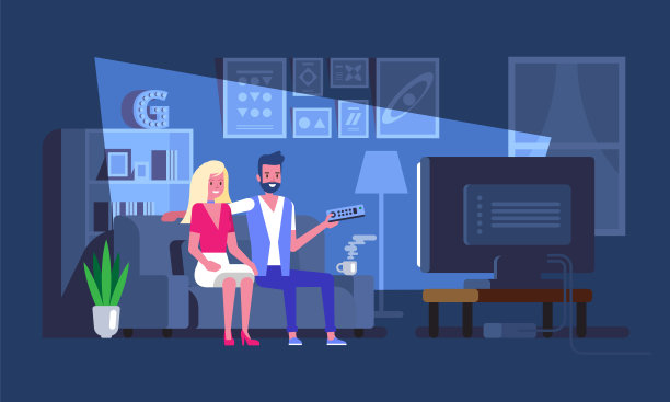 一个女孩和一个男孩正在家里的皮沙发上看一部欢快的电影图片下载