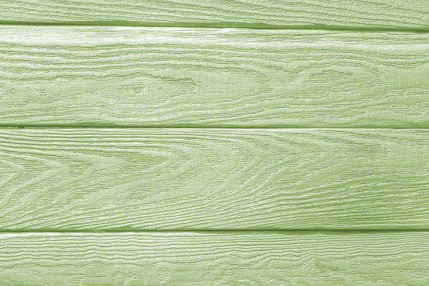 阿月浑子的绿色背景。木纹图片下载