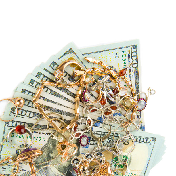 金色珠宝和美元单独在白色。放置你的文本。图片下载
