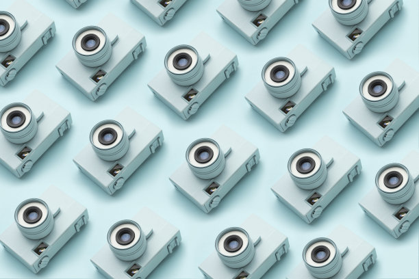 彩色背景上重复相同相机的摄影背景图片下载