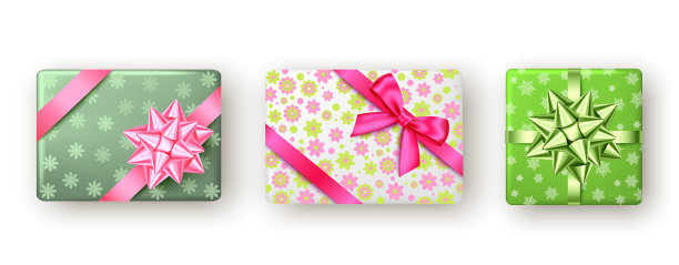 粉白绿相间的礼盒，带丝带和蝴蝶结图片下载