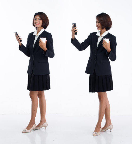 20多岁的年轻亚洲商业女性会计财务穿西装裙，看着工作图片下载