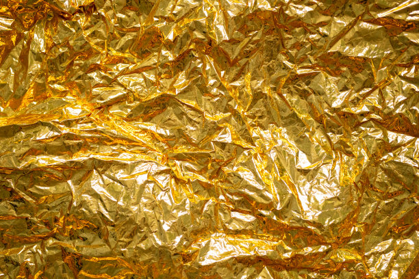 金箔抽象褶皱纹理，近景。图片下载