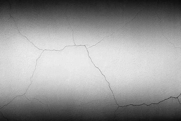 有裂缝的混凝土墙的背景，灯光突出的地方图片下载