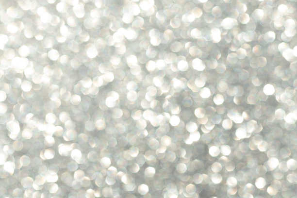 抽象的背景银散焦，模糊的火花。图片下载