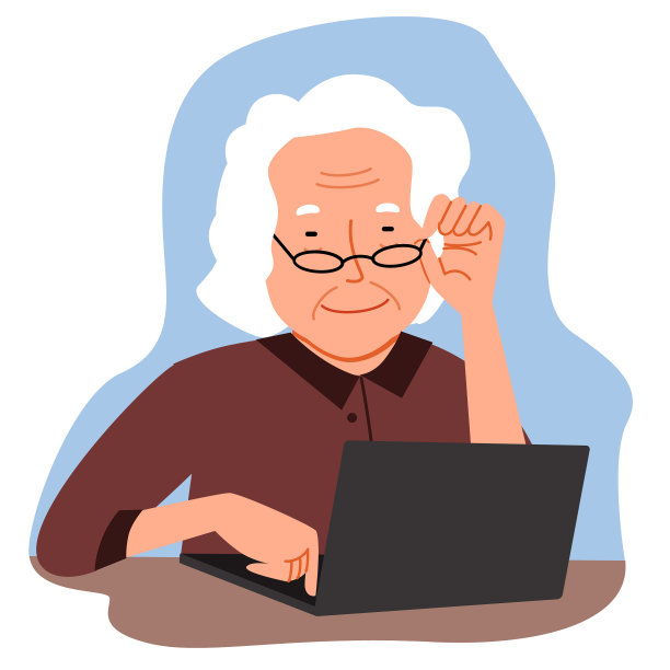 一位工作在家里的老妇人在电脑前可爱地玩耍图片下载