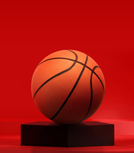 在红色演播室的黑色五边形讲台上的篮球图片下载