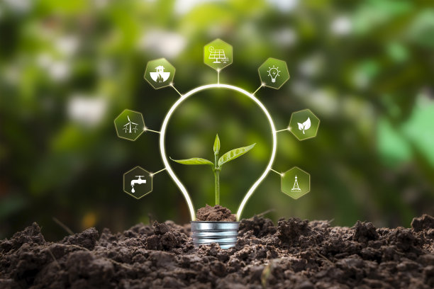 树木生长在土壤和环保能源相关的图标，地球日的概念，和节能。图片下载