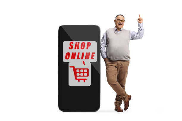 中年男人靠着带有网上购物文字的大手机并向上指图片下载