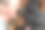 一只大黑狗舔着一个人的脸。成年雌性罗威纳犬亲吻主人。一个充满感情的闭着眼睛的成年男子。图片下载