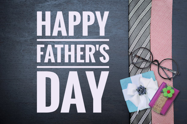 快乐的父亲节横幅与红色和黑色领带设计的黑木背景图片下载