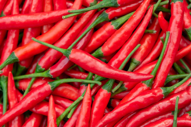 新鲜的红辣椒底色。图片下载