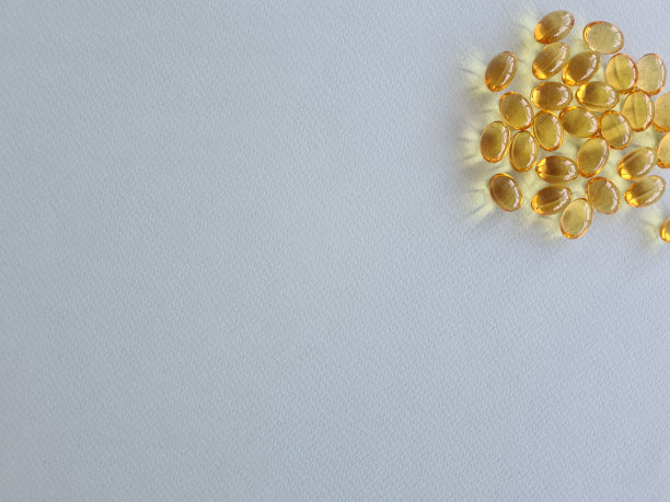 欧米茄3 6 9胶囊，蓝色背景是鱼油图片下载