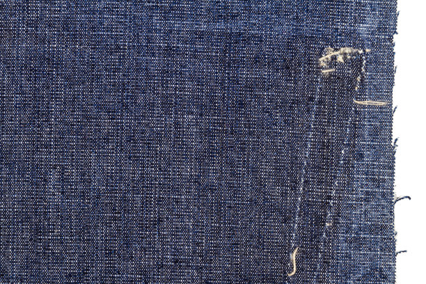 后面口袋有破洞的蓝色牛仔裤面料图片下载