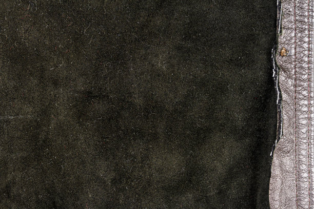 黑色皮革，背面纹理凌乱图片下载