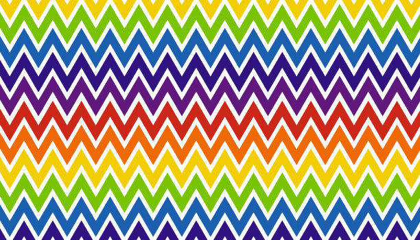 糖果之字形图案背景。丰富多彩的雪佛龙壁纸。彩虹色的概念。矢量插画家。图片下载