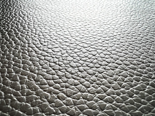 精细的灰色皮革与图案。图片下载