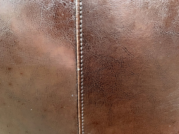 一种有缝作为纹理或背景的非常好的皮革。图片下载