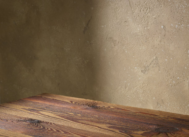 米色墙壁和木桌图片下载