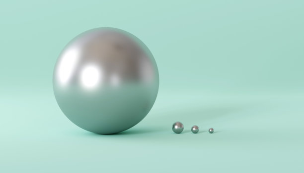 绿色背景上的银色球体。图片下载