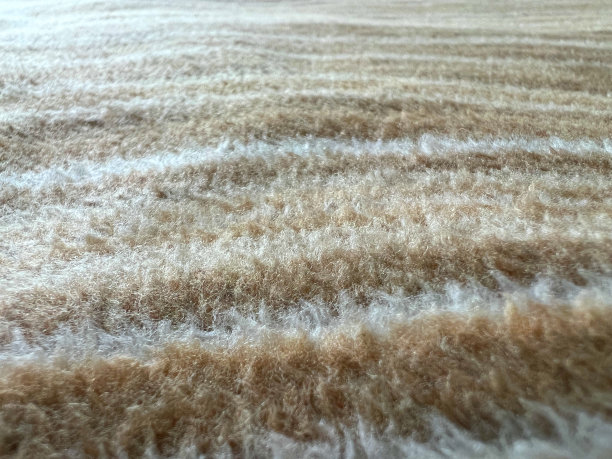 白条纹织物一种漂亮的米色、白色条纹织物作为纹理或背景图片下载