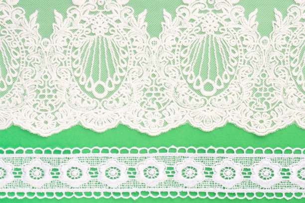 白色蕾丝与图案在绿色水平图片下载