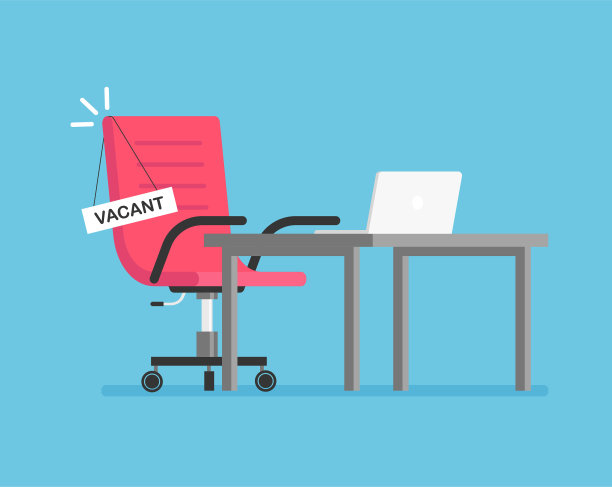 空办公椅旁边的桌子上有一个空牌子。图片下载