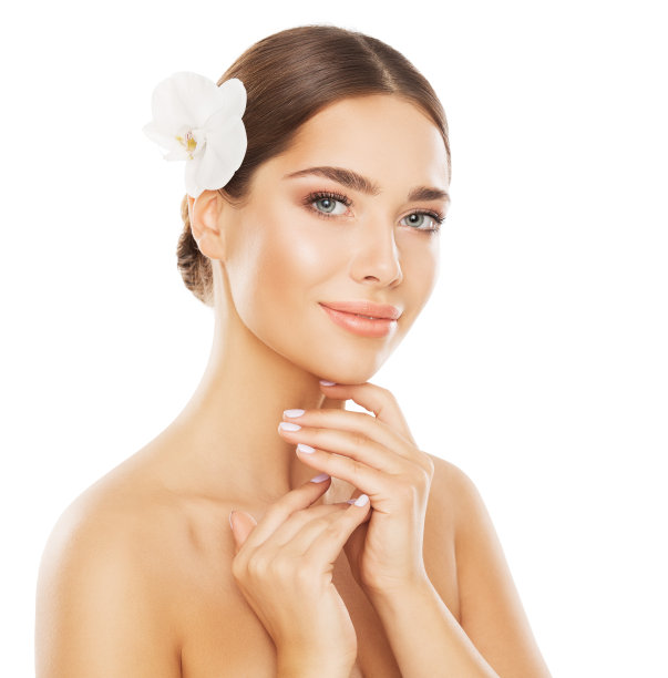 面对美丽的女人。光滑皮肤护理Spa化妆品。美丽的模型与充分的嘴唇和自然化妆与兰花在白色隔离。女性面部美容和整形外科图片下载