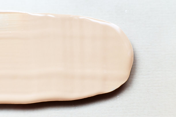 液体色调基础纹理背景。化妆的概念图片下载