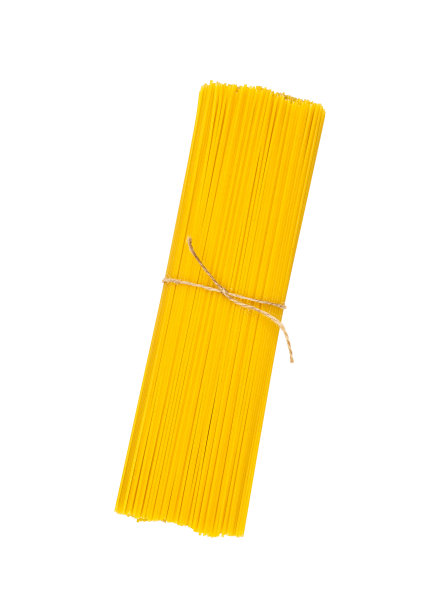 一串黄色的生鸡蛋或小麦意大利面，放在蛋白上图片下载