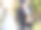 特写后方的一个女运动员伸展她的腿在公园锻炼。适合在户外做热身运动的女运动员图片下载