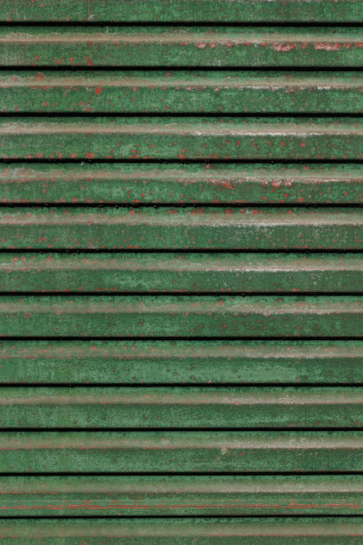 生锈的绿色金属车库门的一部分图片下载