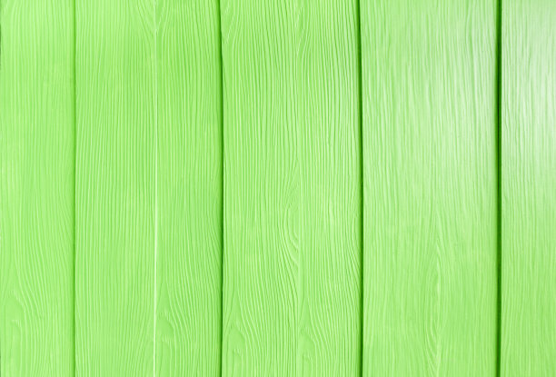 浅绿色的墙面木纹为设计师的背景。图片下载