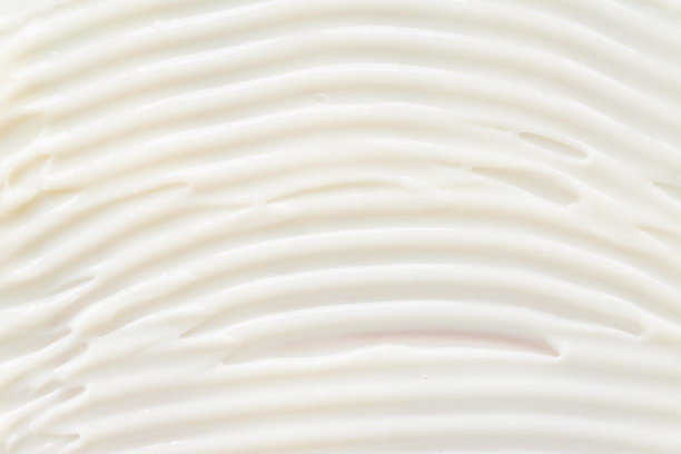 特写白色保湿霜质地。护肤品背景。防晒或液体粉底。图片下载