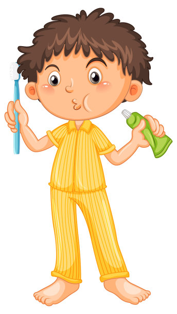 穿着睡衣的男孩拿着牙刷和牙膏图片下载