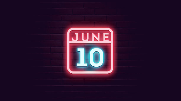 6月10日日历与霓虹蓝色和红色霓虹灯在砖的背景图片下载