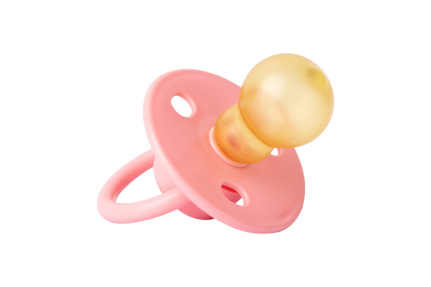 正畸安抚奶嘴孤立于白色。粉红色婴儿奶嘴孤立在白色背景图片下载