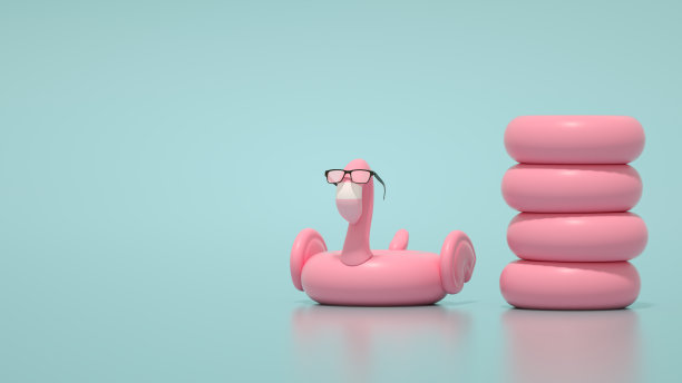 粉色火烈鸟与太阳镜在蓝色背景最小夏季旅行度假背景图片下载