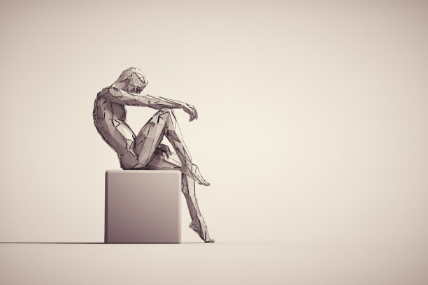 由多边形构成的人在立方体上摆姿势。图片下载