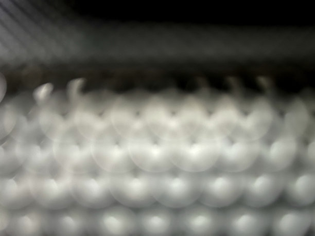 一个模糊的一个与白色，灰色和黑色的效果与圆圈。图片下载