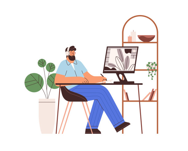 平面设计师在办公桌上用电脑工作图片下载