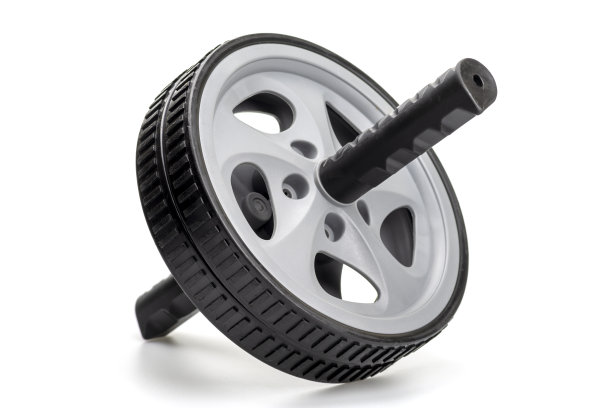 腹肌滚轮，腹部滚轮运动。健身运动辊孤立的白色背景。图片下载