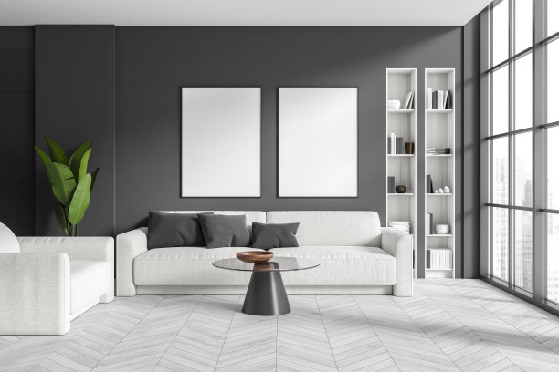 昏暗的客厅里贴着两张空白的白色海报图片下载