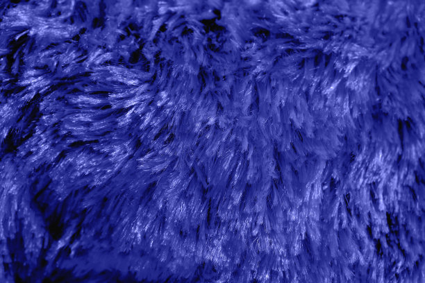 带有复制空间的红色毛茸茸的抽象纹理背景。图片下载