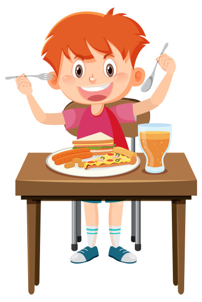 快乐的男孩喜欢吃桌上的食物图片下载