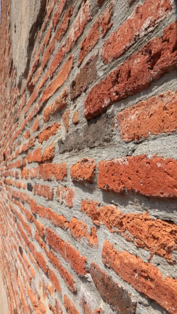 背景纹理的红土石墙。图片下载