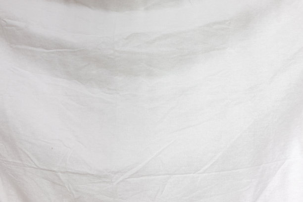 柔软的白色床单表面图片下载