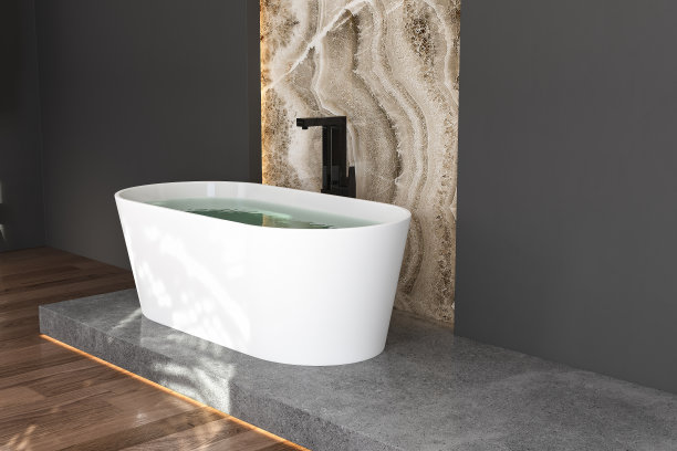 一个白色的浴缸立在混凝土平台上图片下载