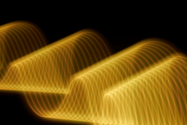 抽象的黄色灯光痕迹画在黑色的背景图片下载